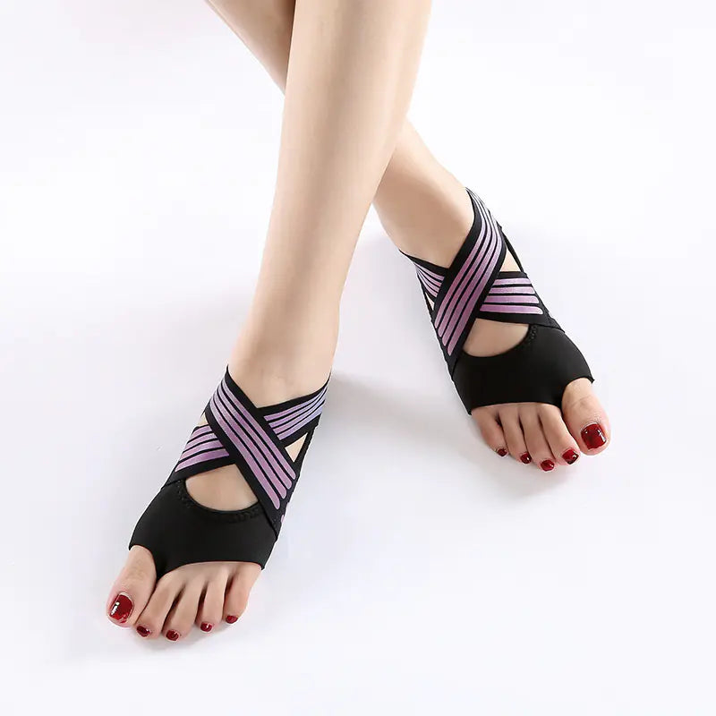 Women's rose red colored non-slip yoga shoes with soft flexible sole for indoor fitness and studio training.