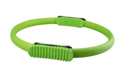 Green yoga and pilates resistance ring.