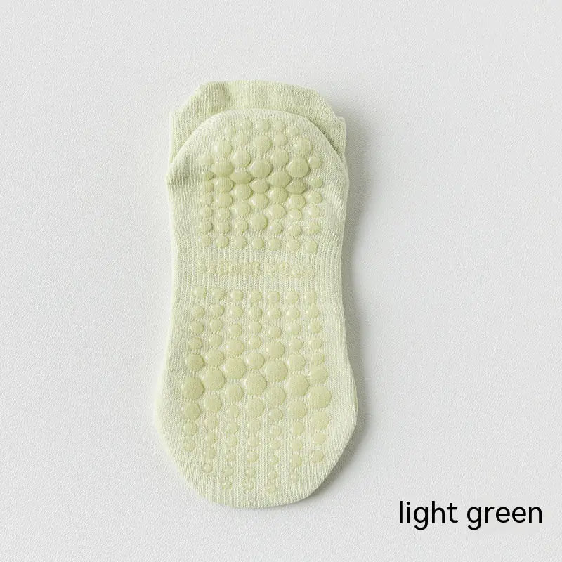 Women's non-slip Pilates socks in light green color with silicone grip for yoga, Pilates and barre classes.