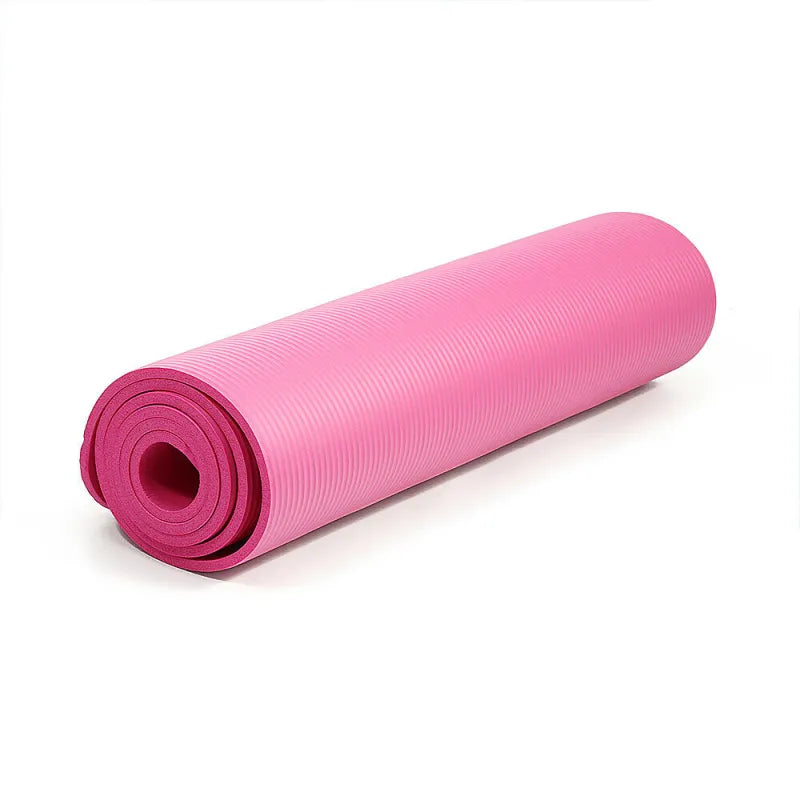 Pink Colored Non-Slip Yoga Exercise Mat for Indoor Workouts and Stretching.