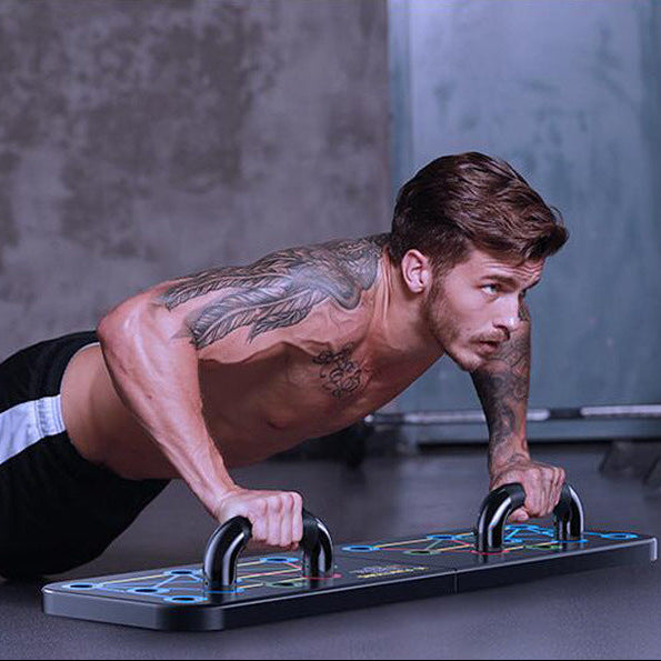 Person using multifunctional push-up board demonstrating proper form and hand positioning.
