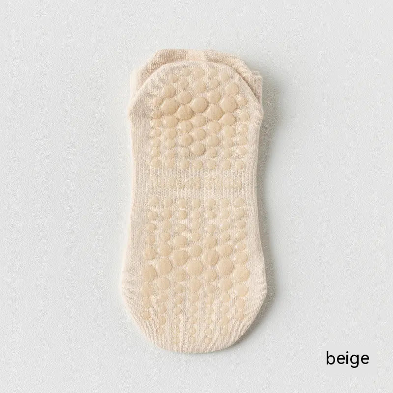 Women's non-slip Pilates socks in beige color with silicone grip for yoga, Pilates and barre classes.
