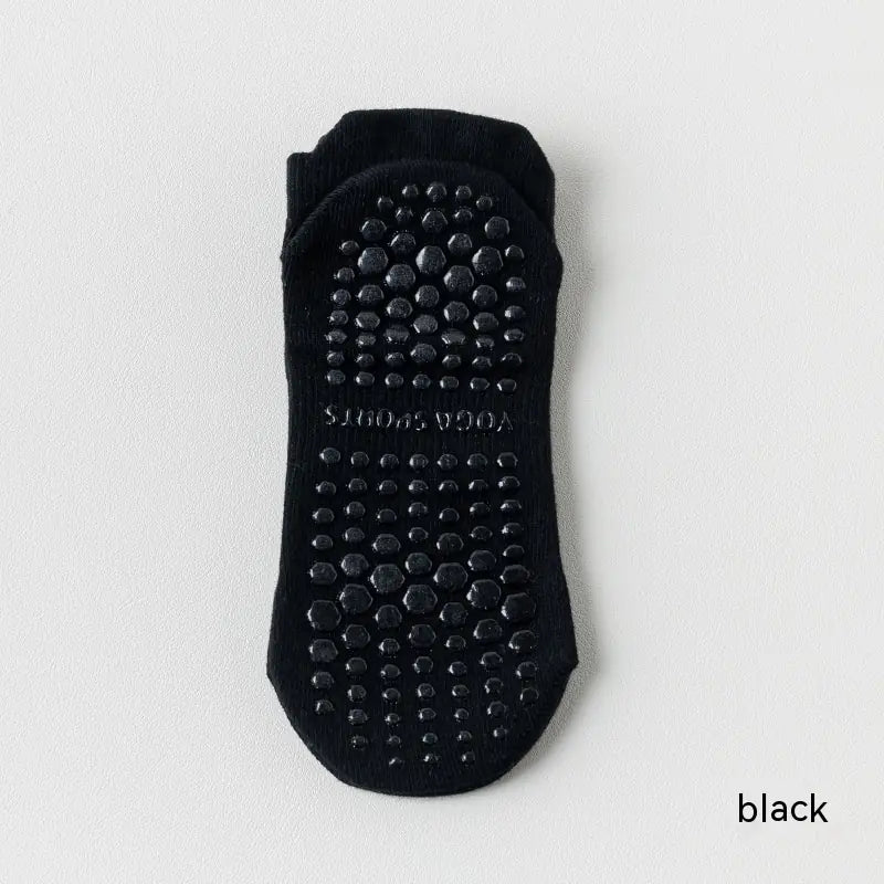 Women's non-slip Pilates socks in black color with silicone grip for yoga, Pilates and barre classes.