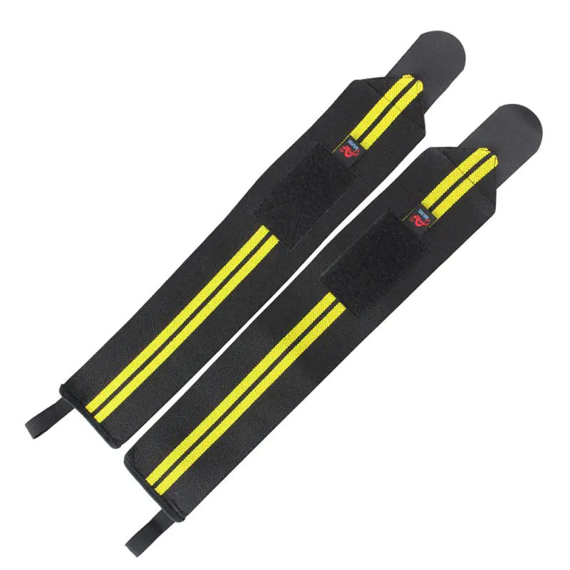Black yellow supportive wrist wraps with adjustable Velcro closure for weightlifting and fitness training.