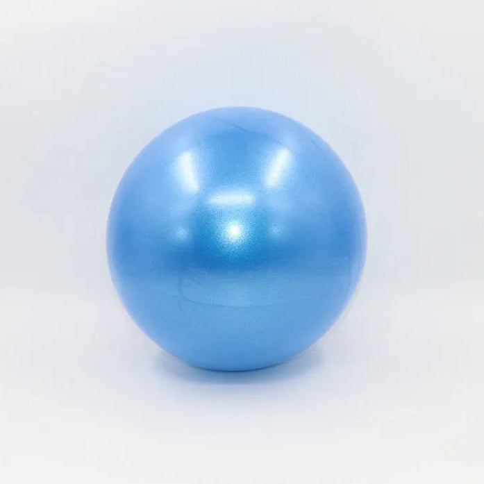 Blue colored portable pilates mini ball for core strengthening, balance training, and yoga exercises.