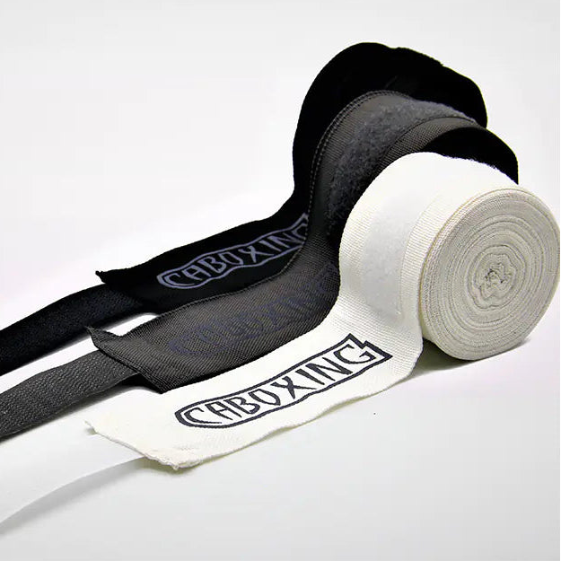 Close-up of durable breathable cotton fabric on boxing hand wraps for comfort.