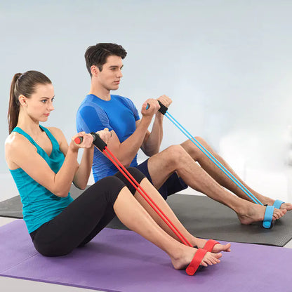 Man and woman using elastic pull rope exercisers for a seated home workout on yoga mats.