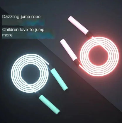 Ergonomic comfortable grip handles on glow-in-the-dark jump rope for secure hold.