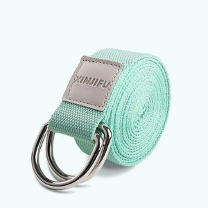 Green elastic stretch strap for back support and flexibility training with multiple grip loops.