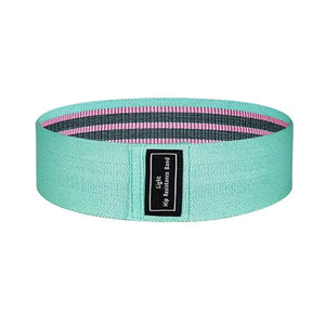 Close-up of soft non-slip green fabric resistance bands for comfortable workouts.