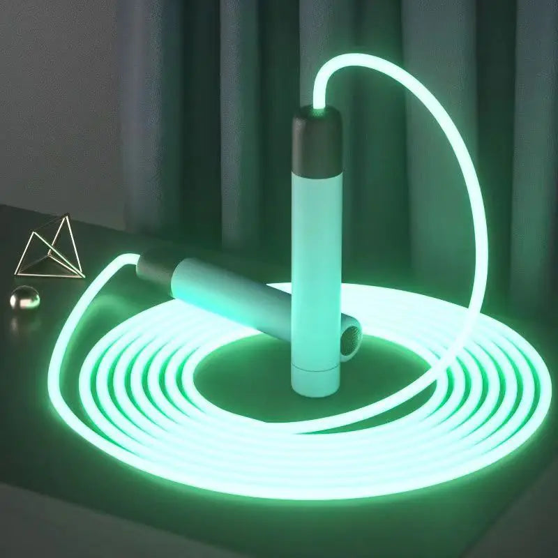 Green luminous (Glow-in-the-dark) jump rope with ergonomic handles for indoor and outdoor cardio workouts.