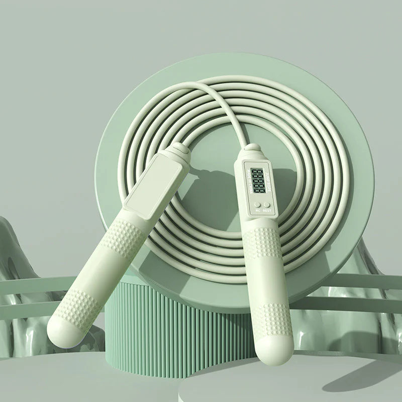 Adjustable length feature on a green smart jump rope for customized fit to any height.