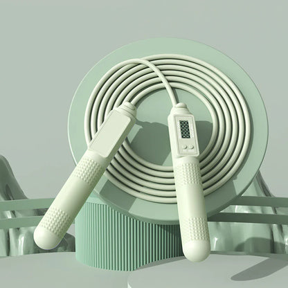 Adjustable length feature on a green smart jump rope for customized fit to any height.
