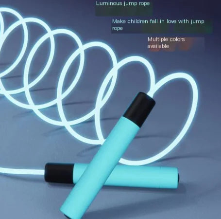 Close-up of glow-in-the-dark jump rope showing illuminated effect in low light conditions.