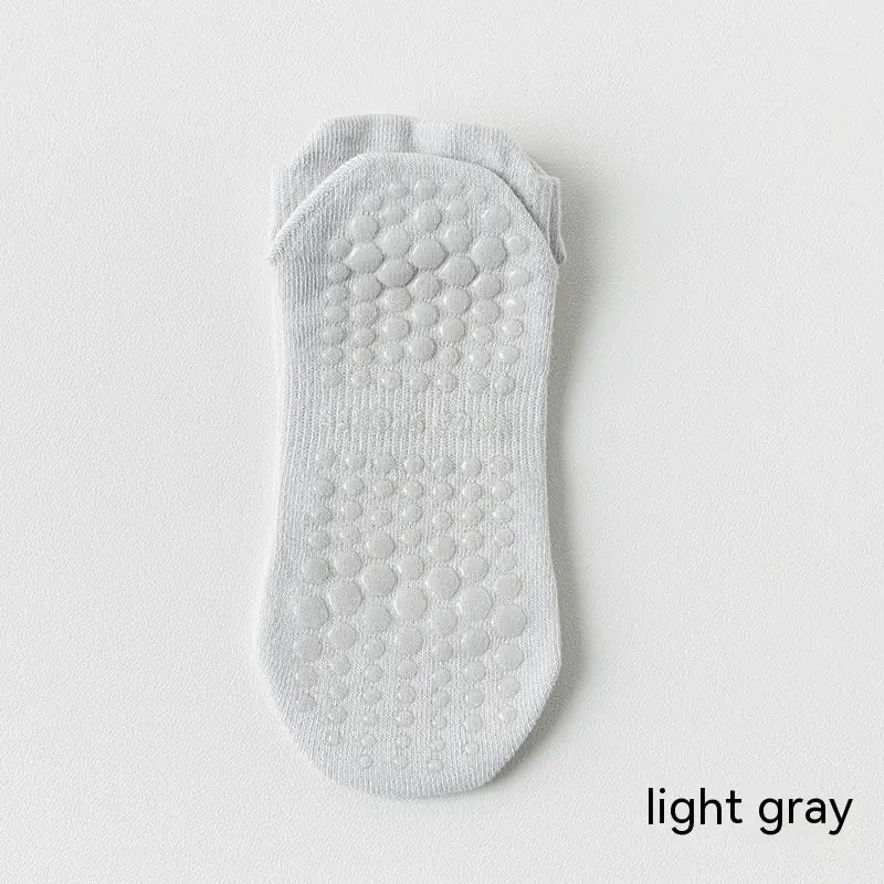 Women's non-slip Pilates socks in light gray color with silicone grip for yoga, Pilates and barre classes.