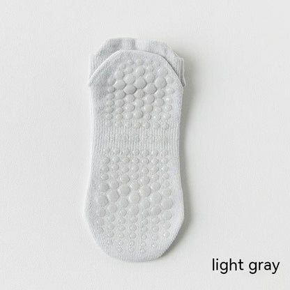 Women's non-slip Pilates socks in light gray color with silicone grip for yoga, Pilates and barre classes.