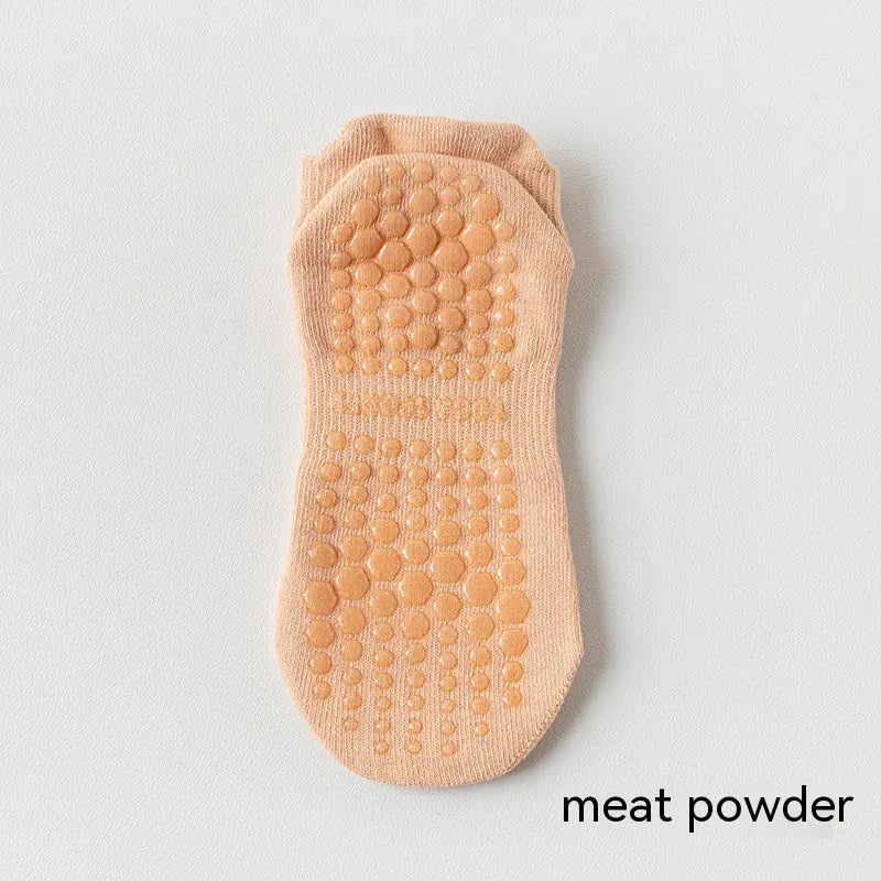 Women's non-slip Pilates socks in meat pink color with silicone grip for yoga, Pilates and barre classes.