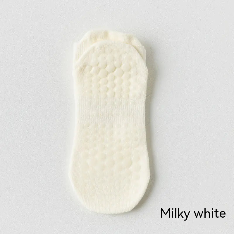 Women's non-slip Pilates socks in milk white color with silicone grip for yoga, Pilates and barre classes.