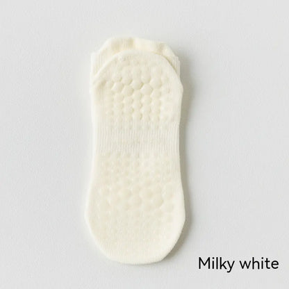 Women's non-slip Pilates socks in milk white color with silicone grip for yoga, Pilates and barre classes.