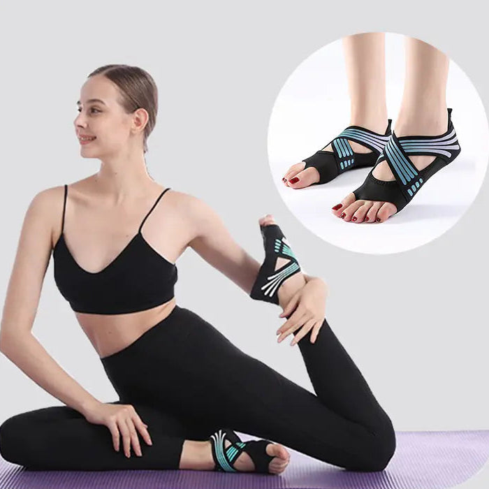 Woman in yoga pose wearing non-slip shoes for secure grip and stability on studio floor.