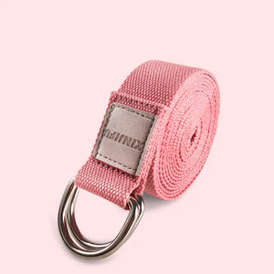 Pink elastic stretch strap for back support and flexibility training with multiple grip loops.
