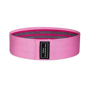 Close-up of soft non-slip pink fabric resistance bands for comfortable workouts.