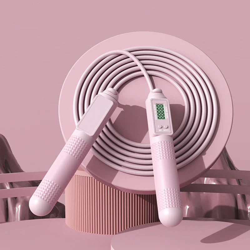 Adjustable length feature on a pink smart jump rope for customized fit to any height.