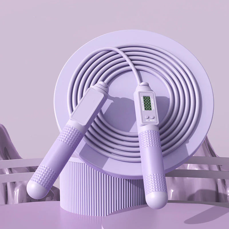 Adjustable length feature on a purple smart jump rope for customized fit to any height.