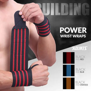 Person wearing black and red supportive wrist wraps with adjustable Velcro closure for a custom fit and secure support.